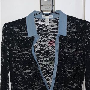 Selling a black laced button down shirt.